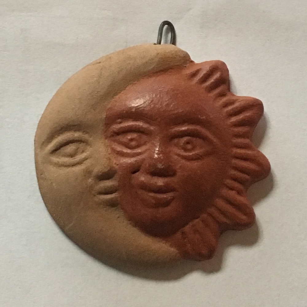 Artisan made sun and moon pendant